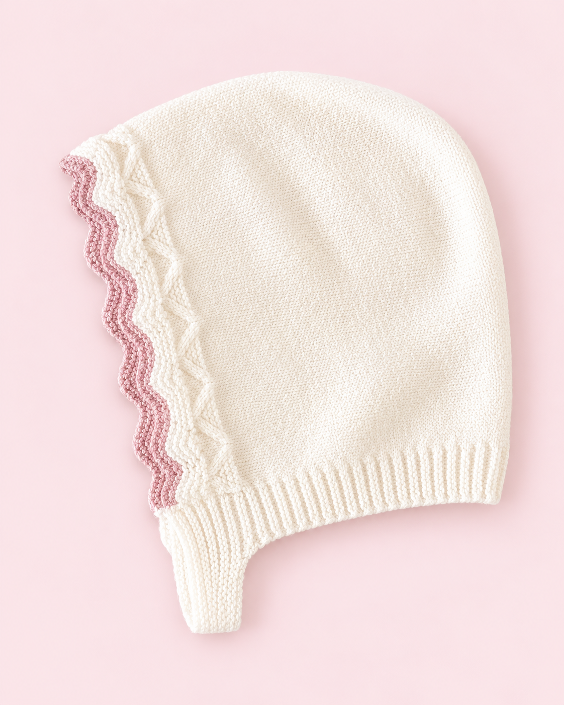 Cream bonnet with pink scalloped edging