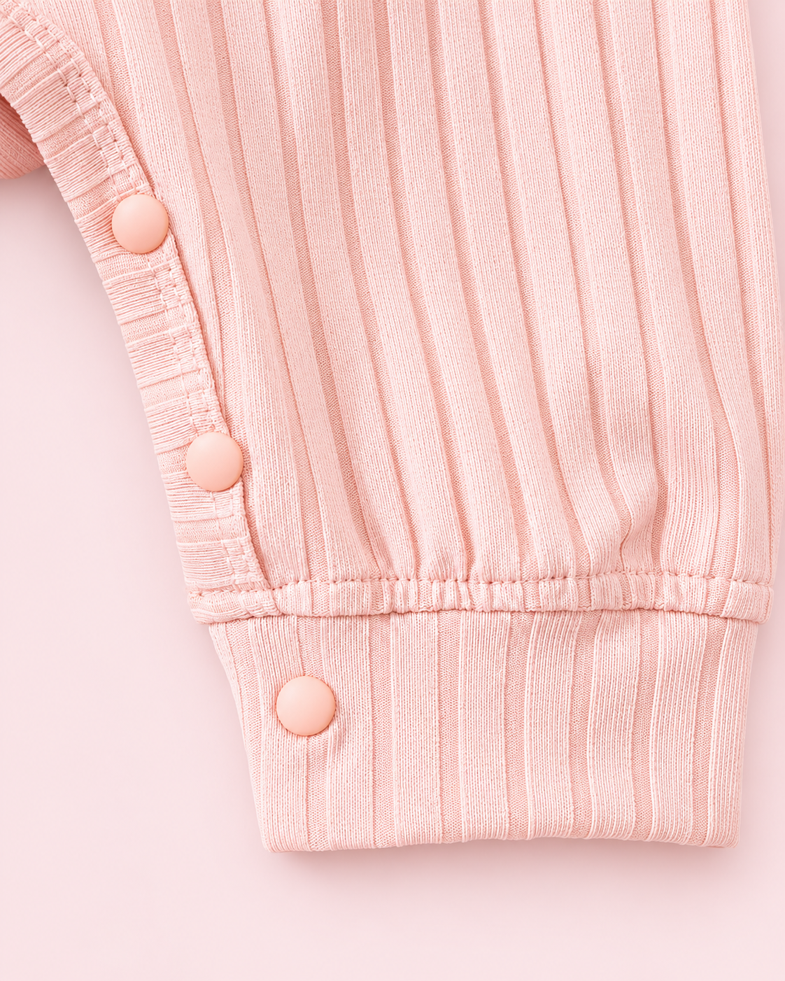 Light pink ribbed ankle cuff and snap detail